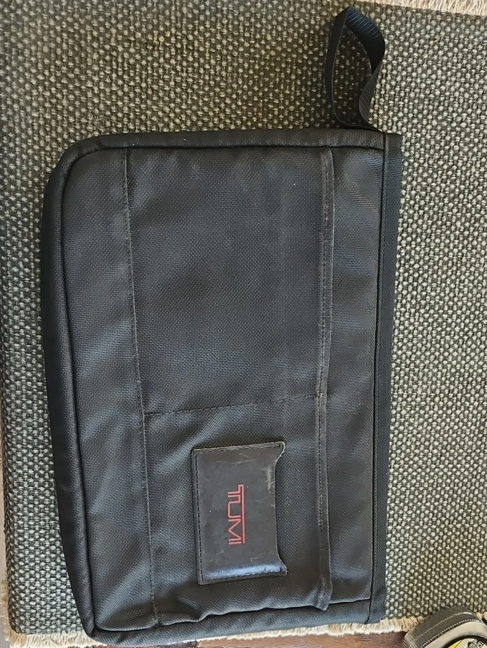 Tumi Black Laptop Sleeve with Red Logo Accent